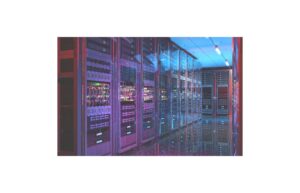 Here's a short alt tag for the image: `Data center server room`